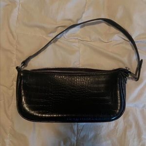 black faux leather baguette bag
